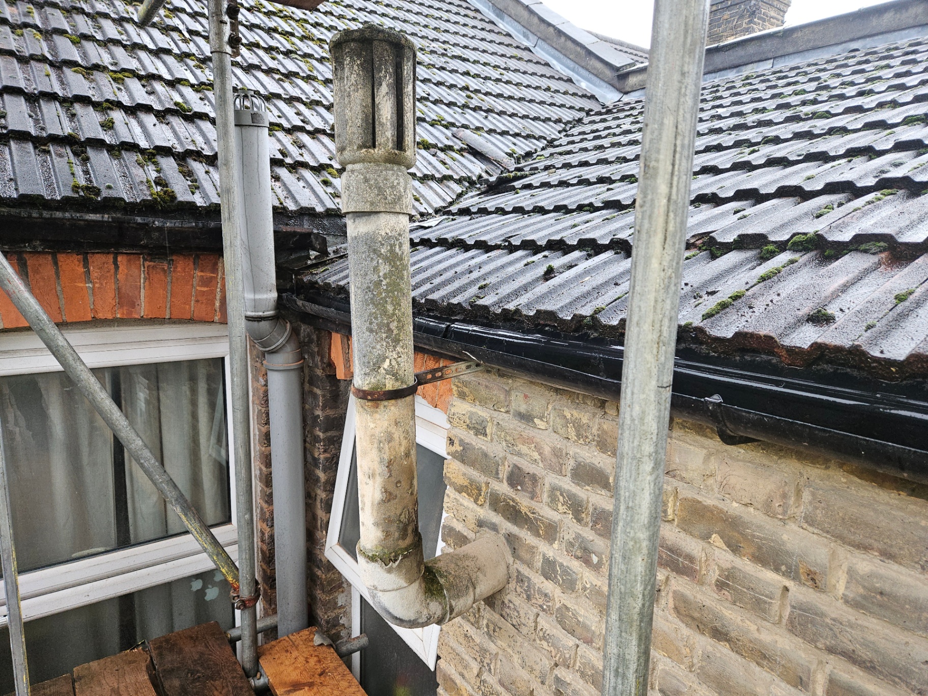 Cement flues & rainwater goods photographed during an Elements asbestos survey